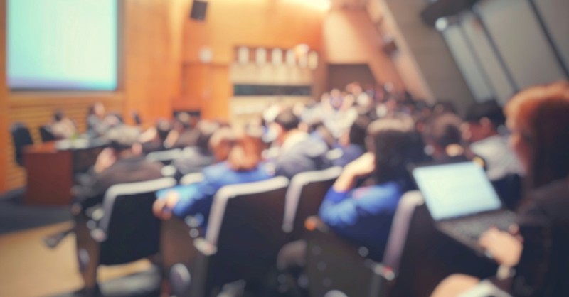 people in auditorium to illustrate seventh-day adventist conference