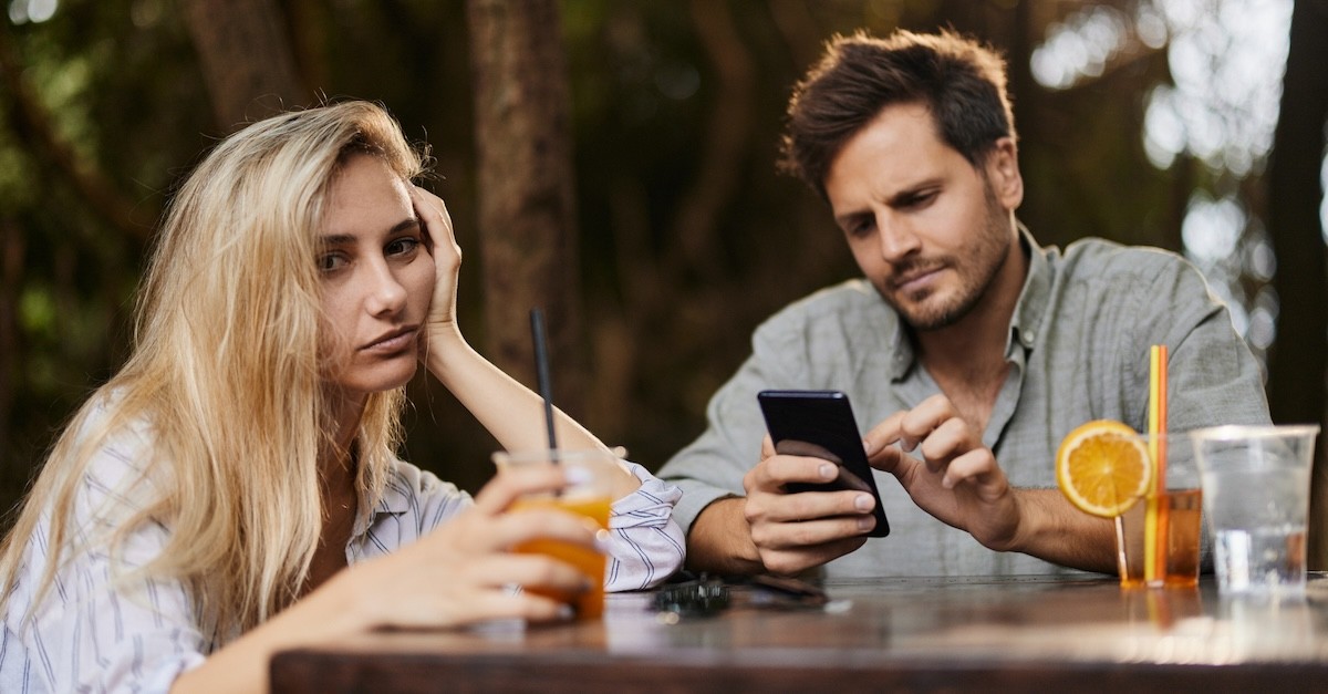 Married couple bored on date night at restaurant husband on phone ignoring wife; what is the sin of sloth?