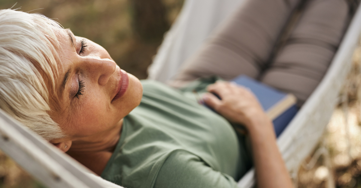 Woman relaxing in a hammock; what saving grace is NOT